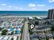 Aerial view of the building and its proximity to the beach at 9661 Shore Dr. # C-14, Myrtle Beach, SC 29572