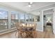 Bright dining area with table and chairs, near large windows at 9661 Shore Dr. # C-14, Myrtle Beach, SC 29572