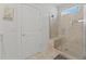 Modern bathroom with a large walk-in shower and built-in seat at 1113 Mary Read Dr., North Myrtle Beach, SC 29582