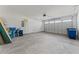 Spacious garage with overhead door and storage shelving at 1113 Mary Read Dr., North Myrtle Beach, SC 29582