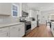 Modern kitchen with stainless steel appliances and granite countertops at 1113 Mary Read Dr., North Myrtle Beach, SC 29582