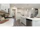 White kitchen with gas range, ample counter space, and stainless steel appliances at 114 Ranch Haven Dr., Murrells Inlet, SC 29576