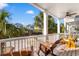 Balcony with wooden rocking chairs and street view at 116B 15Th Ave. N, Surfside Beach, SC 29575