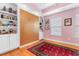 Bedroom with built-in shelving, wood floors, and a murphy bed at 116B 15Th Ave. N, Surfside Beach, SC 29575