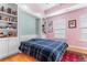 Guest bedroom with a murphy bed and built-in shelving at 116B 15Th Ave. N, Surfside Beach, SC 29575