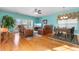 Bright dining area with hardwood floors and seating for four at 116B 15Th Ave. N, Surfside Beach, SC 29575