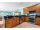 Modern kitchen with stainless steel appliances and granite countertops at 116B 15Th Ave. N, Surfside Beach, SC 29575