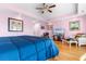 Main bedroom with a comfy seating area and large TV at 116B 15Th Ave. N, Surfside Beach, SC 29575