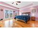 Spacious main bedroom with hardwood floors and private balcony access at 116B 15Th Ave. N, Surfside Beach, SC 29575