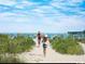 Scenic beach access path leading to the ocean at 1218 Spinnaker Dr., North Myrtle Beach, SC 29582