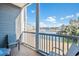 Enjoy scenic pond and community views from this screened balcony at 131 Waypoint Ridge Ave. # Q13, Little River, SC 29566