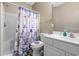 Clean bathroom with a shower/tub combo and a coastal-themed shower curtain at 131 Waypoint Ridge Ave. # Q13, Little River, SC 29566