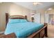 King-size bed in spacious bedroom with access to bathroom and kitchen at 131 Waypoint Ridge Ave. # Q13, Little River, SC 29566