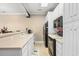 Modern kitchen with black appliances and light-colored cabinetry at 131 Waypoint Ridge Ave. # Q13, Little River, SC 29566