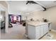 Kitchen with white cabinets and a view to living area at 131 Waypoint Ridge Ave. # Q13, Little River, SC 29566