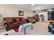 Living room with sectional sofa, coffee table, and large TV at 131 Waypoint Ridge Ave. # Q13, Little River, SC 29566