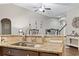 Granite kitchen island with sink and breakfast bar seating at 1400 Rainsbrook Ct., Conway, SC 29526