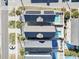 Overhead aerial view of homes with pools, showcasing the outdoor living spaces at 1514-A S Ocean Blvd., Surfside Beach, SC 29575