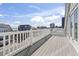 Ocean view deck with white railing and gray flooring at 1514-A S Ocean Blvd., Surfside Beach, SC 29575