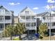 Two-story beach home with light colored siding at 1514-A S Ocean Blvd., Surfside Beach, SC 29575