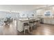 Open kitchen boasts a large center island, stainless steel appliances and barstool seating at 1514-A S Ocean Blvd., Surfside Beach, SC 29575