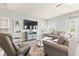 Cozy living room with hardwood floors, ample seating and a large TV at 1514-A S Ocean Blvd., Surfside Beach, SC 29575