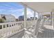 Porch with rocking chairs and ocean view at 1514-A S Ocean Blvd., Surfside Beach, SC 29575