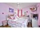 Adorable pink bedroom featuring a full-size bed and stylish decor at 155 Busbee St., Conway, SC 29526