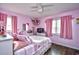 Charming pink bedroom with a comfy bed and plenty of storage at 155 Busbee St., Conway, SC 29526