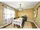 Elegant dining room features a table for four and a stylish chandelier at 155 Busbee St., Conway, SC 29526