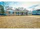 Brick ranch house with a landscaped yard at 155 Busbee St., Conway, SC 29526