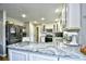 Modern kitchen with granite countertops and white cabinets at 155 Busbee St., Conway, SC 29526