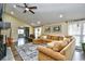 Spacious living room with L-shaped sofa and fireplace at 155 Busbee St., Conway, SC 29526