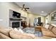 Spacious living room with L-shaped sofa and fireplace at 155 Busbee St., Conway, SC 29526