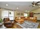 Spacious living room with L-shaped sofa and fireplace at 155 Busbee St., Conway, SC 29526