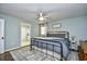 Relaxing main bedroom offers a king-size bed and ensuite bathroom access at 155 Busbee St., Conway, SC 29526