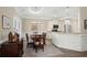 Elegant dining room featuring a formal table, chairs, and access to the kitchen at 1625 Crosswinds Ave., North Myrtle Beach, SC 29582