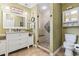 Clean bathroom with updated vanity, large shower, and toilet at 1671 Arundel Rd., Myrtle Beach, SC 29577