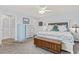 Main bedroom with large bed, dresser, and light blue accents at 1671 Arundel Rd., Myrtle Beach, SC 29577