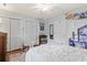 Bedroom with double bed, built-in shelving, and window shutters at 1671 Arundel Rd., Myrtle Beach, SC 29577