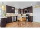 Updated kitchen featuring dark wood cabinets and stainless steel appliances at 1671 Arundel Rd., Myrtle Beach, SC 29577