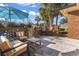 Relaxing patio area with seating and brick wall at 1671 Arundel Rd., Myrtle Beach, SC 29577