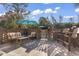 Relaxing poolside patio with seating and umbrella at 1671 Arundel Rd., Myrtle Beach, SC 29577