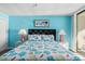 Bedroom with a queen bed and ocean-themed decor at 1690 North Waccamaw Dr. # 807, Garden City Beach, SC 29576