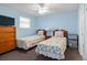 Bedroom with twin beds and a mini-fridge at 1690 North Waccamaw Dr. # 807, Garden City Beach, SC 29576