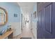 Bright hallway with light walls and wood-look floors at 1690 North Waccamaw Dr. # 807, Garden City Beach, SC 29576