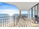 Spacious balcony with ocean view and seating for four at 1690 North Waccamaw Dr. # 807, Garden City Beach, SC 29576