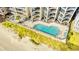 Aerial view of oceanfront community pool at 1690 North Waccamaw Dr. # 807, Garden City Beach, SC 29576