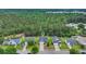 Aerial view of the property showcasing its landscaping and neighborhood at 184 Retreat Pl., Little River, SC 29566