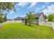 Wide backyard showing patio, and white picket fence at 184 Retreat Pl., Little River, SC 29566